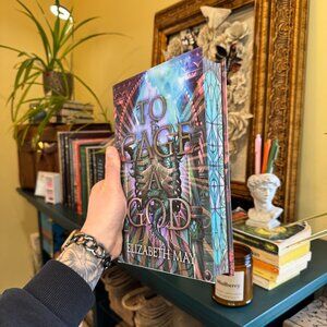To Cage A God by Elizabeth May (Illumicrate Exclusive)